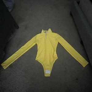 Yellow GCDS zip up bodysuit,size:XS